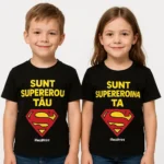 Tricouri copii negre personalizate cu mesaj „Sunt supereroul tău / Sunt supereroina ta”, imprimeu galben cu simbol roșu Superman, iRealPrint, contrast puternic pe fundal negru