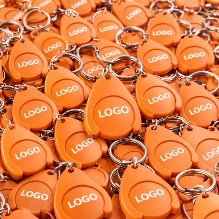 Brelocuri cu fisă din plastic portocaliu pentru cărucior personalizat, prezentare bulk promoțională ideală pentru retail, distribuție în masă și campanii cu vizibilitate ridicată