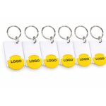 Close-up breloc dreptunghiular cu FISĂ de cumpărături galben, detaliu produs cu suprafață optimă pentru tampografie sau print color și branding memorabil