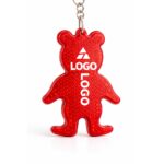 breloc reflectorizant roșu personalizat prins la chei, model ursuleț pentru campanii de siguranță și prevenție în trafic