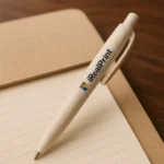 Pix promotional crem din paie de grau personalizat asezat pe agenda obiect eco pentru branding