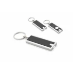 Compoziție cu brelocuri LED negre personalizabile, design business premium și utilizare zilnică pentru branding profesional discret